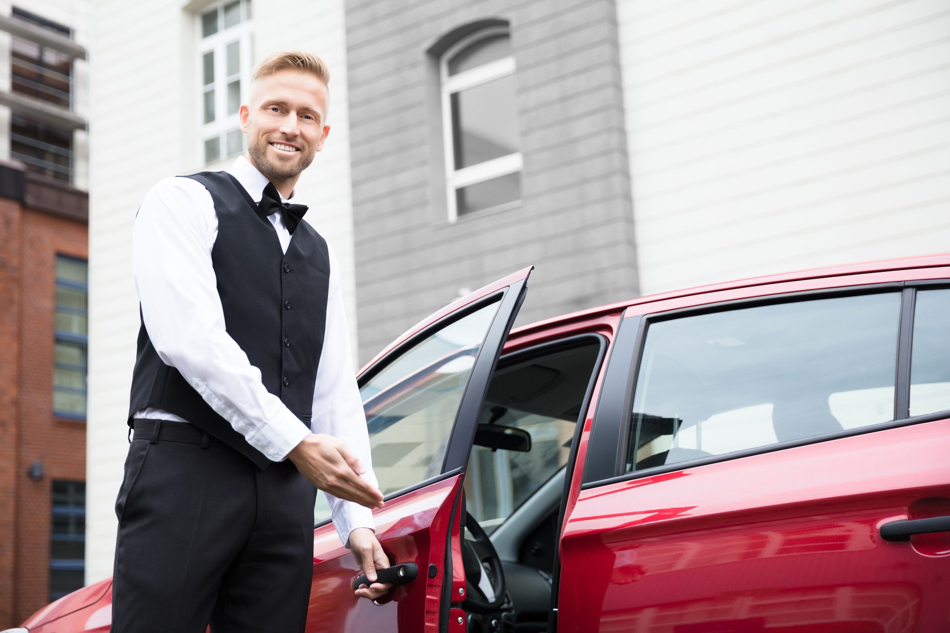 Male Valet Opening Car Door